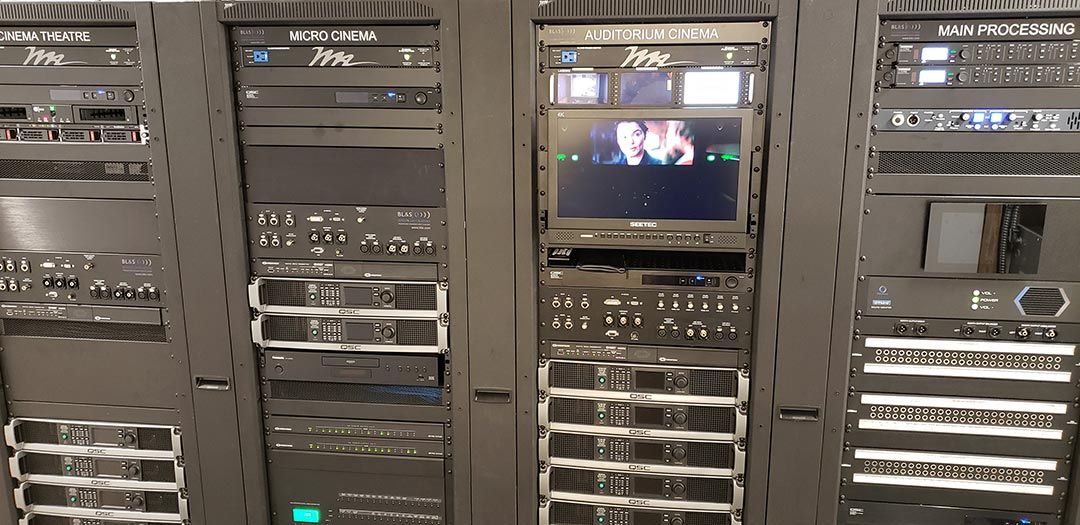 Lighting control booth overlooking the stage and seating area