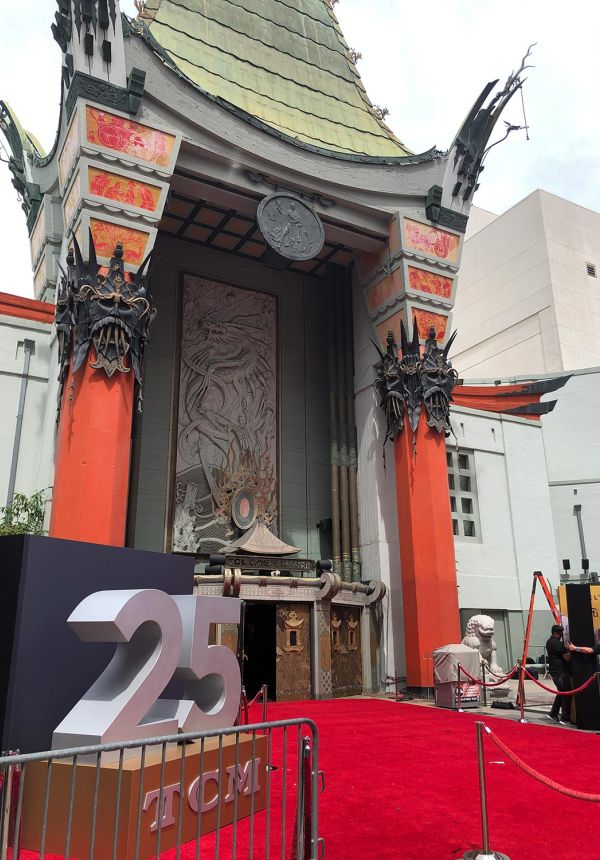 Chinese Theatre entrance with red carpet and 25th anniversary TCM display